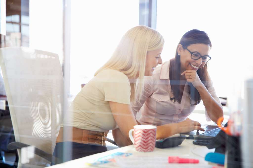 Two women leaders enjoying a successful mentorship 